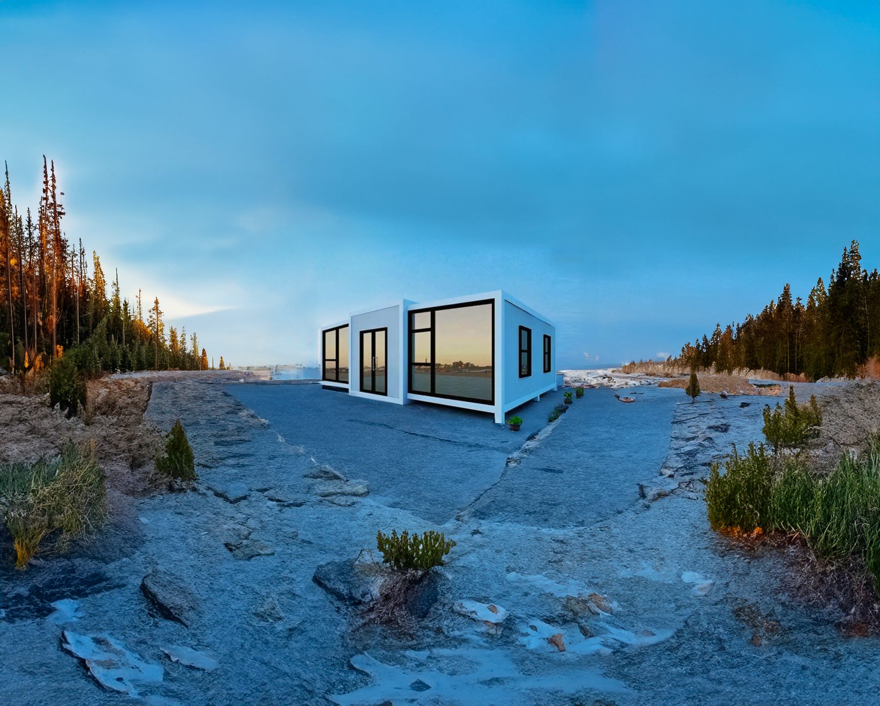 Two joined white expandable units on a rocky clearing among pine trees